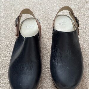 Dansko Black and Tan Leather Clogs